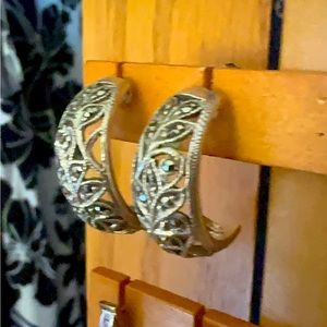 Sterling silver and Marcasite hoops.